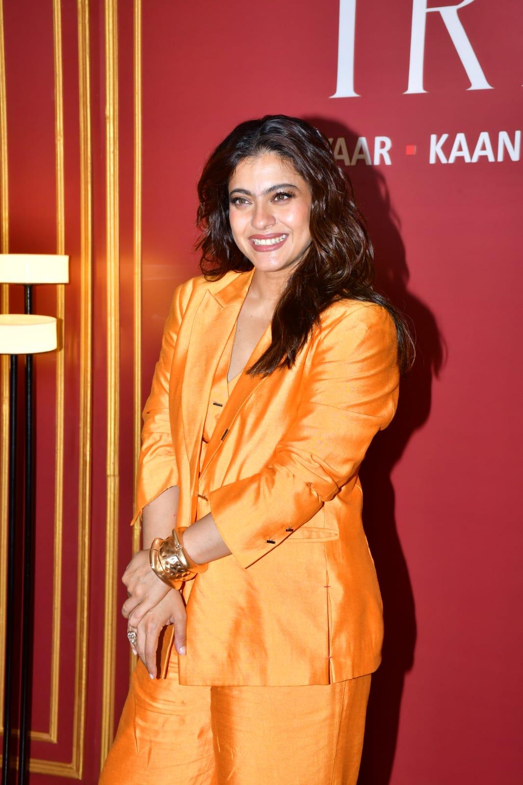 In an orange pant suit, Kajol effortlessly commanded attention with her bold and vibrant choice.